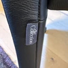 Bacher Brandon Stuhl Echtleder schwarz auf Rollen Design Esszimmerstuhl Label