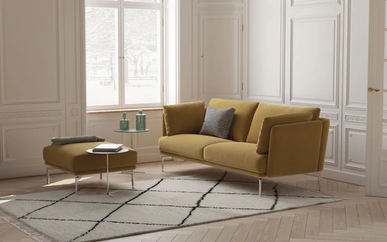 Detailansicht Sofa Mara – Aluminium- oder Holzfüße in verschiedenen Ausführungen