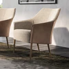 JORI Fuga JR-9980 Beistellsessel, Seitenansicht im Wohnraum, elegantes schwarz lackiertes Gestell
