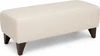 DEMA Ottomanne Hocker 110 x 50 cm in Creme als Freisteller im Hochformat, länglicher Polsterhocker mit glattem Bezug, feiner Steppnaht und dunklen Holzfüßen.
