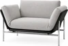 Rataplan Sofa freigestellt auf weißem Hintergrund mit modernem Chromrahmen Stoffbezug