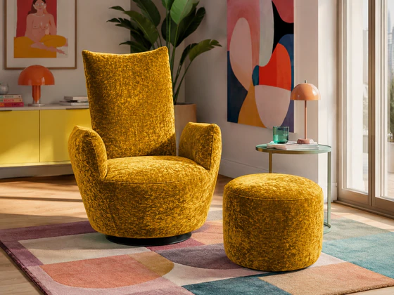 Bullfrog Blobb 1008 Schaukelsessel mit Hocker im Stoff Boheme barrique in moderner Wohnumgebung mit farbigen Akzenten, Pflanzen und Designteppich