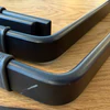 Freischwinger Stuhl schwarz Metallgestell Leder braun Detqil Armlehne