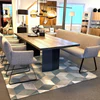 Essgruppe Abverkauf: Tisch Mammut 220x100 geköhlte Asteiche mit Rohstahl-Doppelwange und Heaven Dining Sofa plus Armlehnstühle