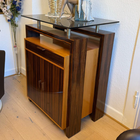 Seitenansicht der Annibale Colombo Design-Workstation – Ebenholz/Kirschbaum mit klassischer Linienführung