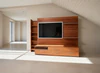 TV-Schrank Amar von AERA Design in edlem Nussbaum – moderne Paneelwand mit Schubladen und Regalen in Frontansicht