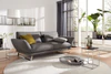 IP Design Clou im Wohnambiente – Sofa mit verstellbaren Armlehnen und Metallkufen